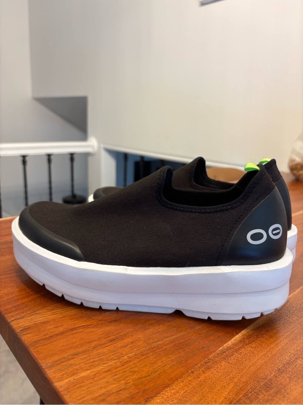OOFOS OOmg eeZee Low Slip-On Black Platform Sneakers with White Sole